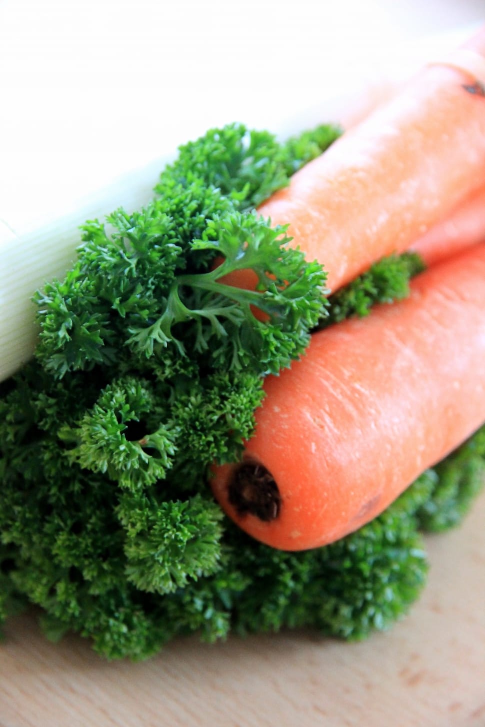 green leafy vegetable and 2 carrots preview