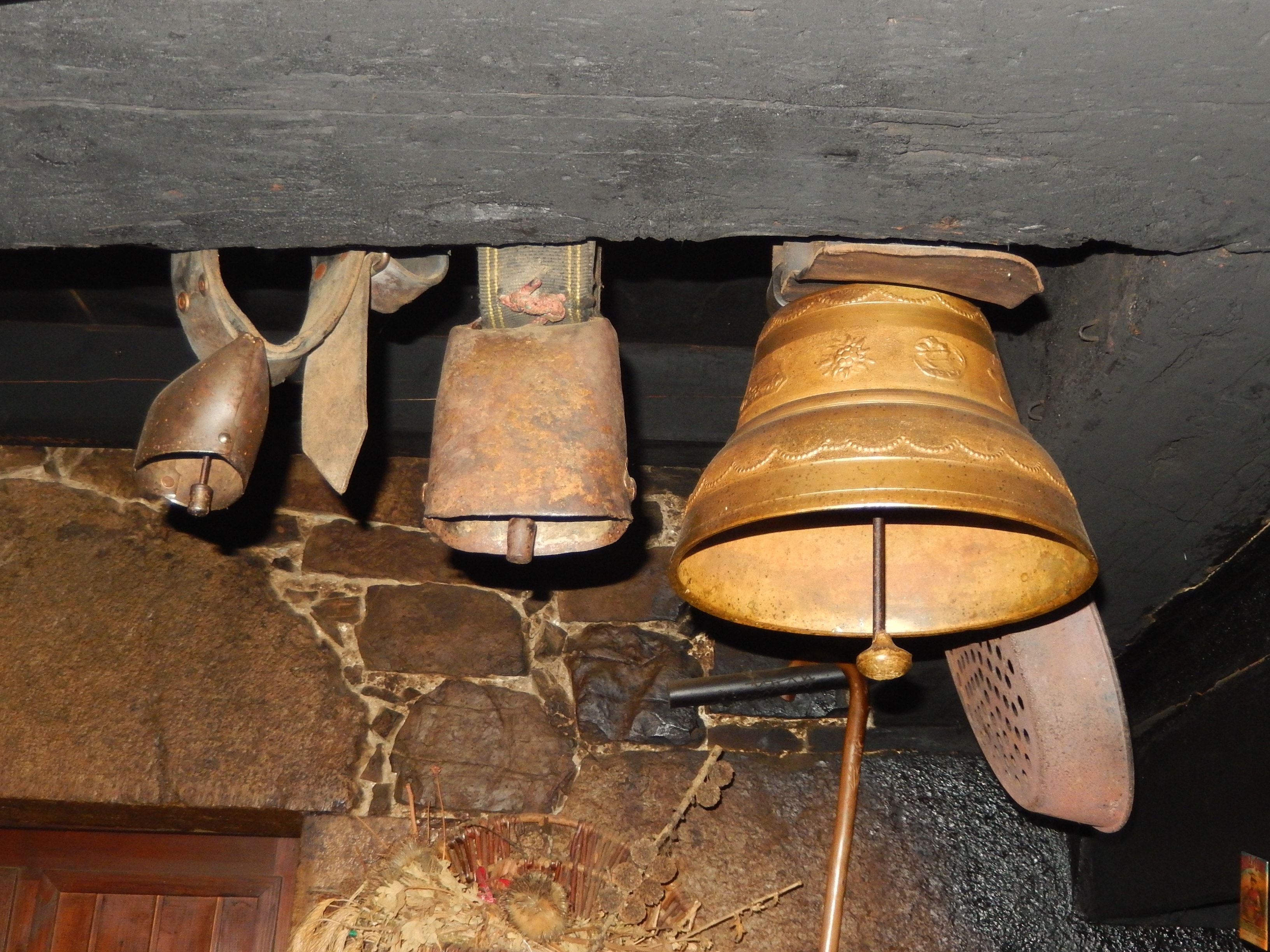 three metal bells