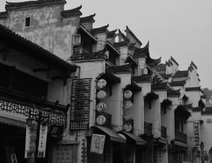 white and black photographed buildings thumbnail