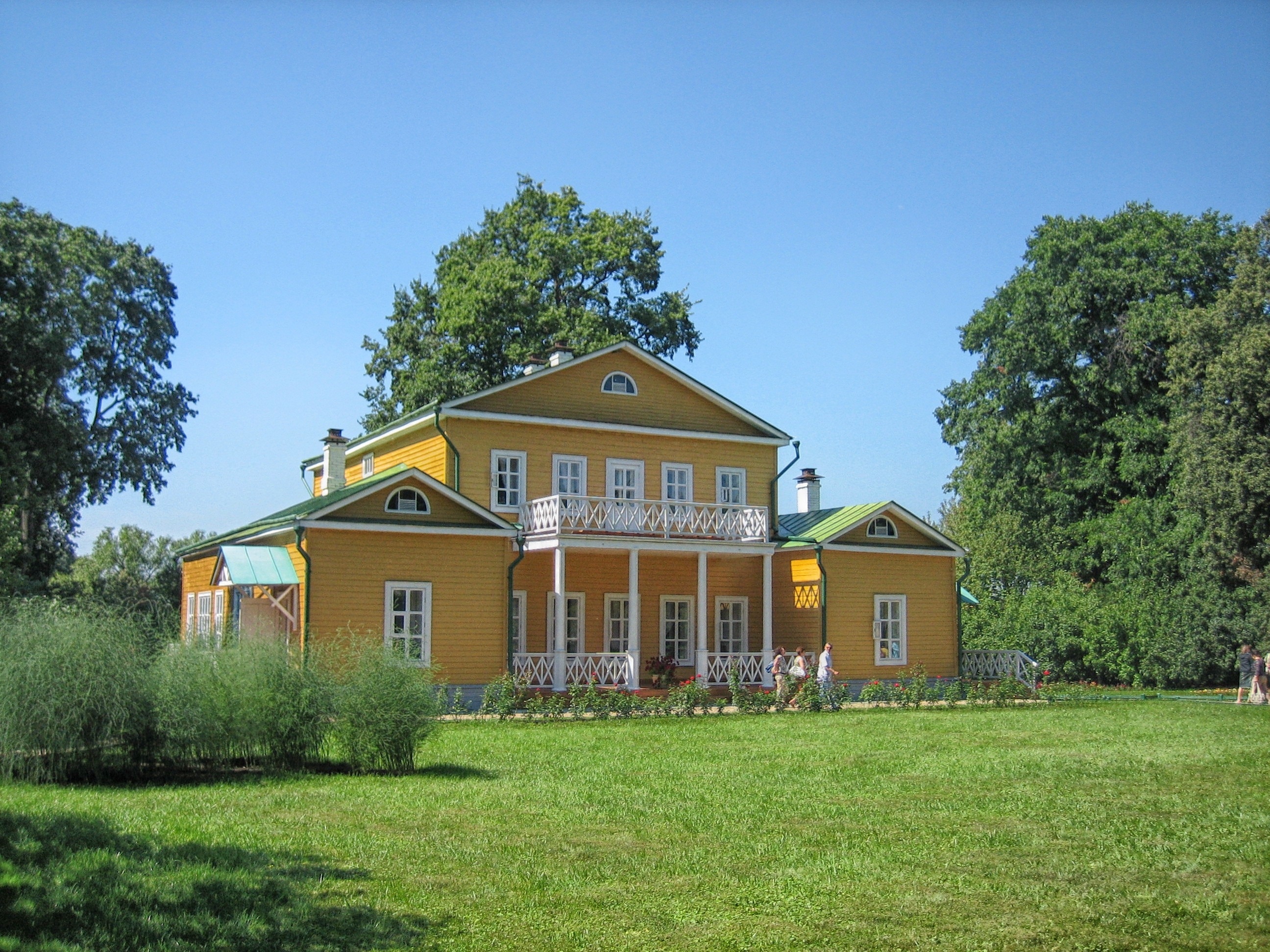 brown and white 2 storey house