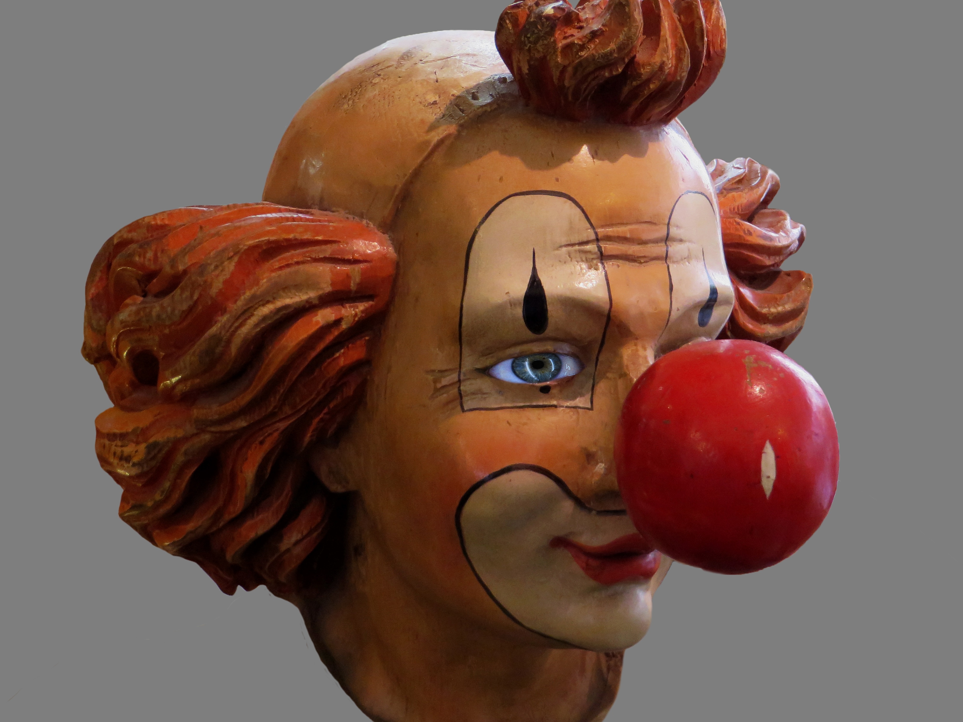 brown haired ceramic clown decor