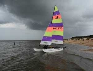 white purple yellow and pink sailboat thumbnail