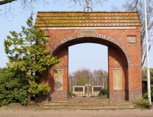 beige and brown brick arch way thumbnail