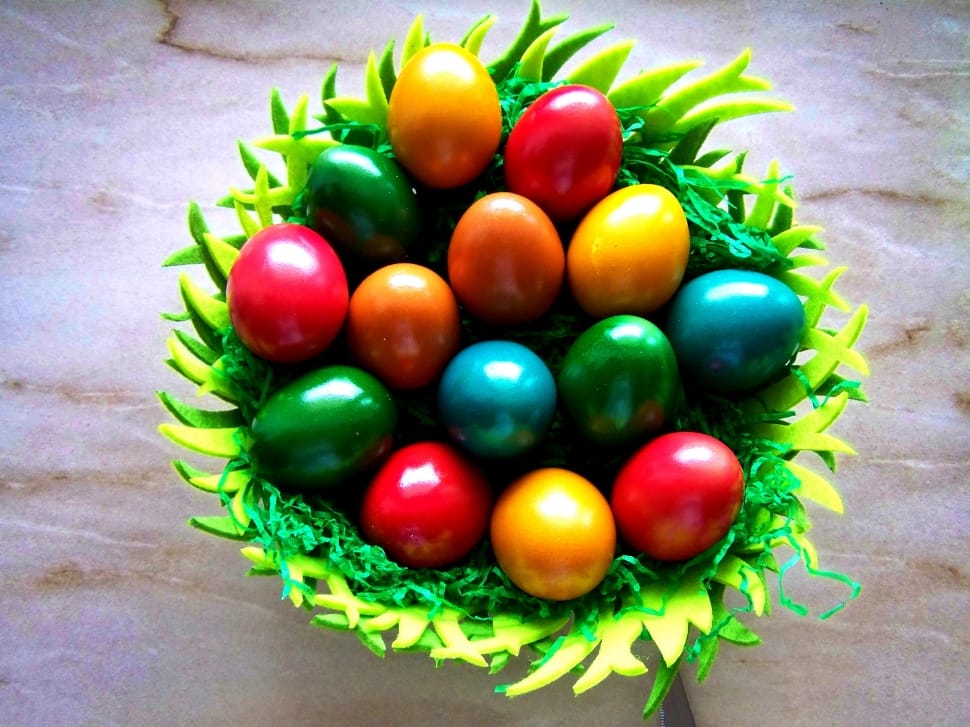 green basket filled with colored egg lot preview