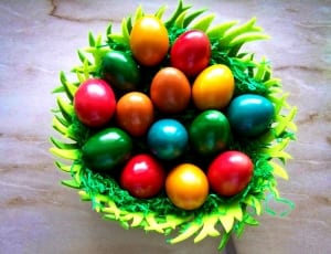 green basket filled with colored egg lot thumbnail