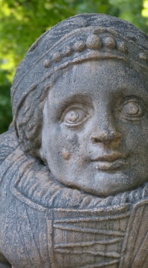 person in grey concrete statue thumbnail