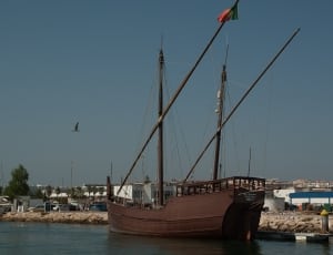 brown sail boat thumbnail