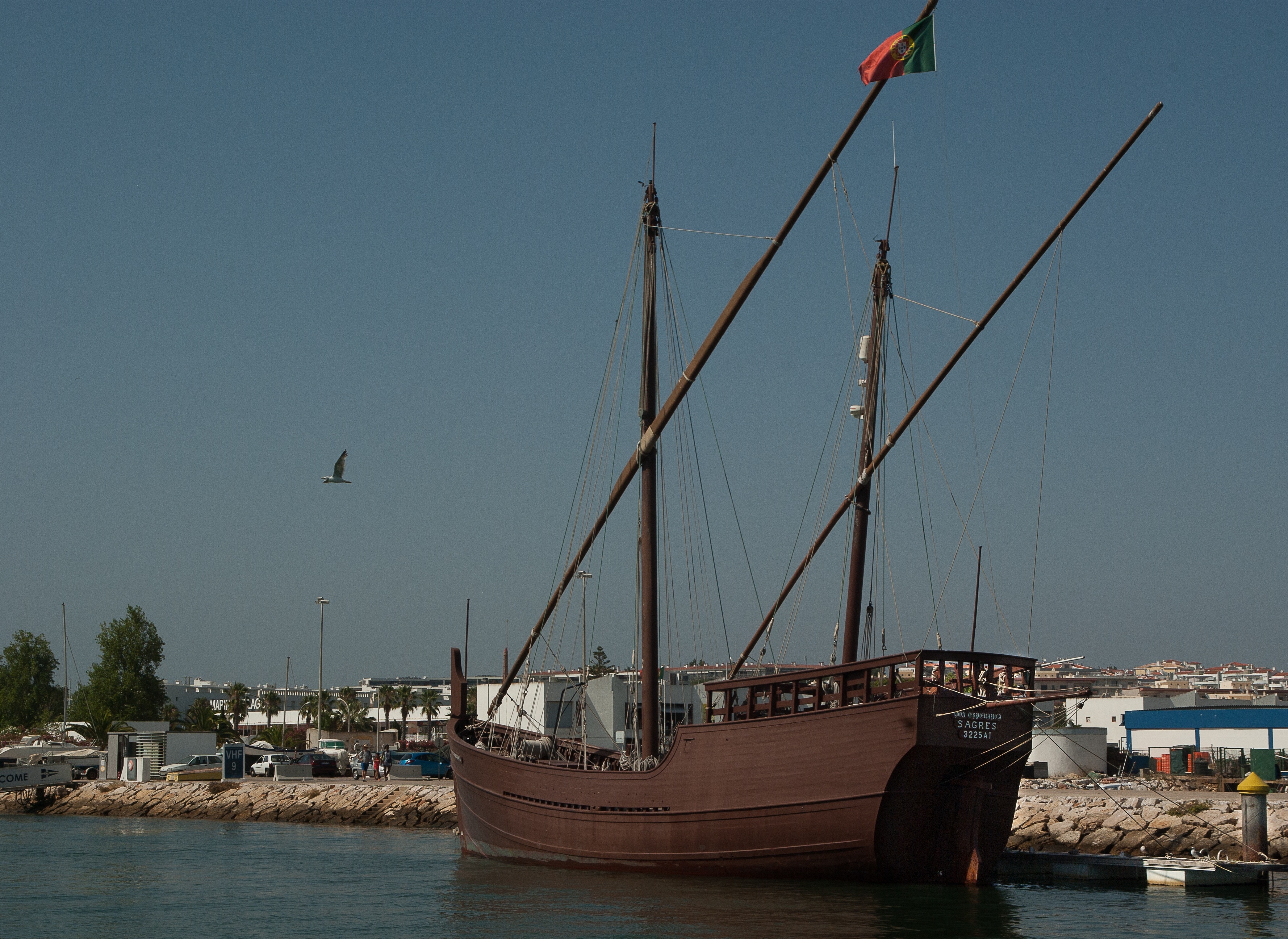 brown sail boat
