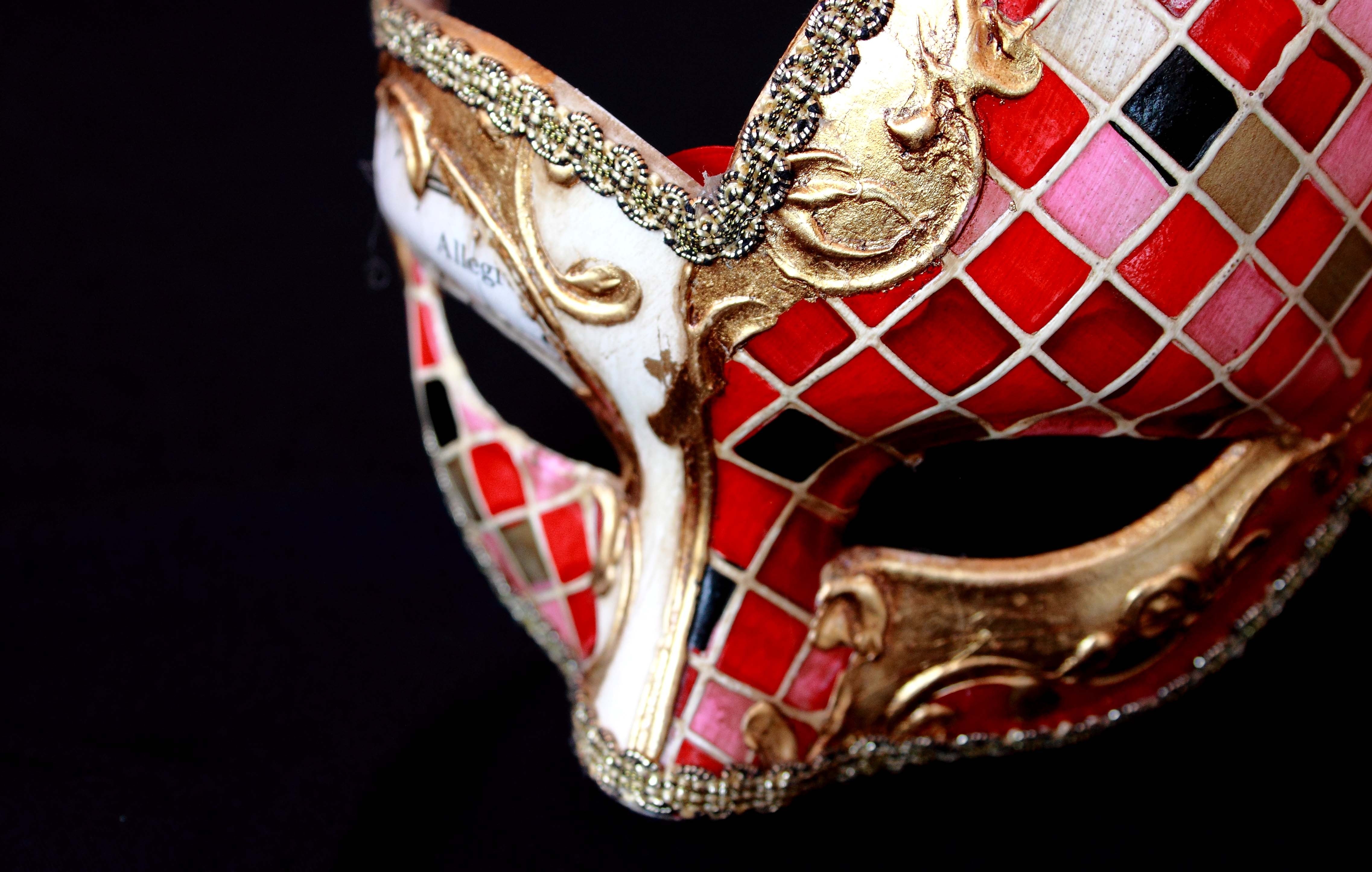 brass and red masquerade