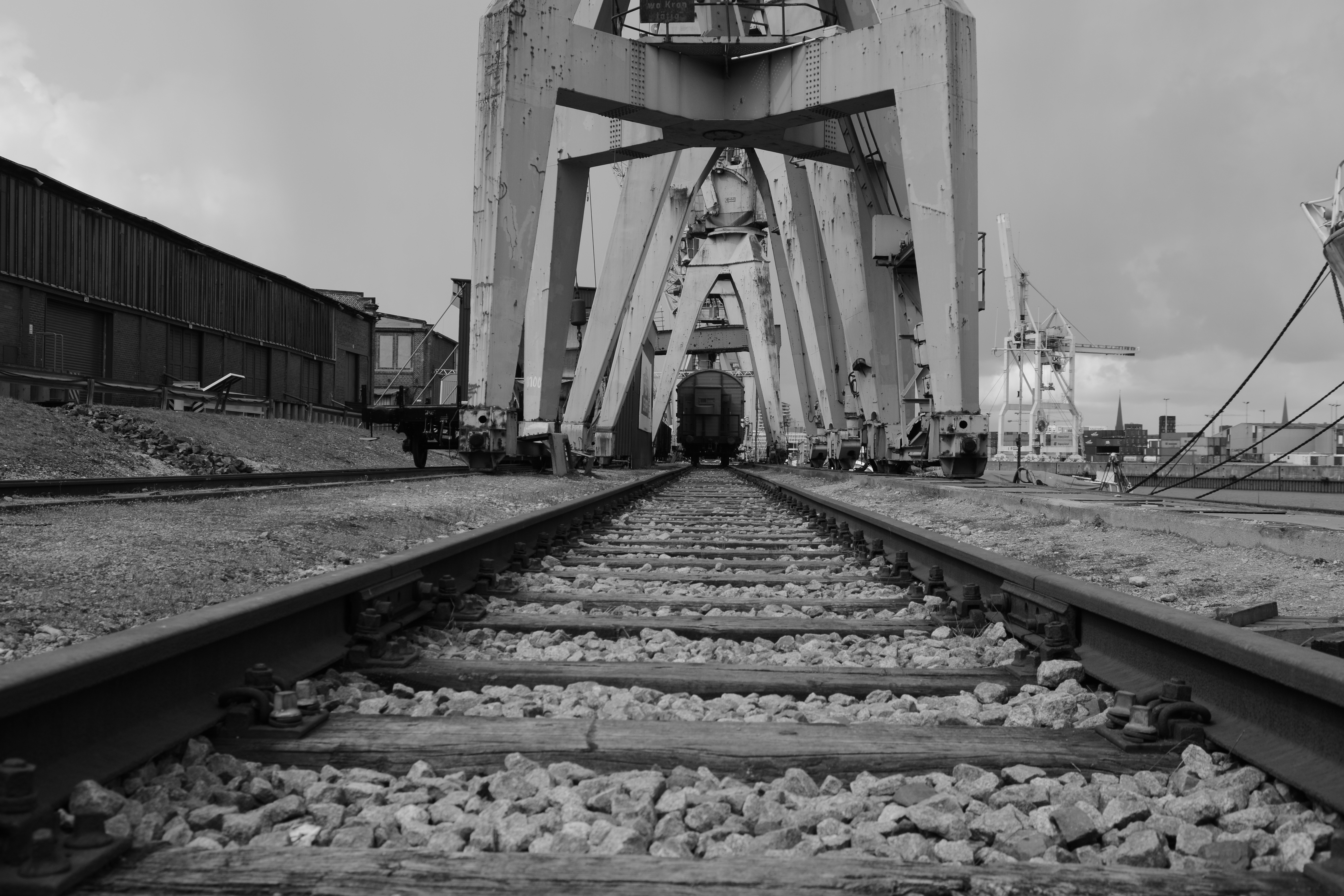 greyscale photo of railway