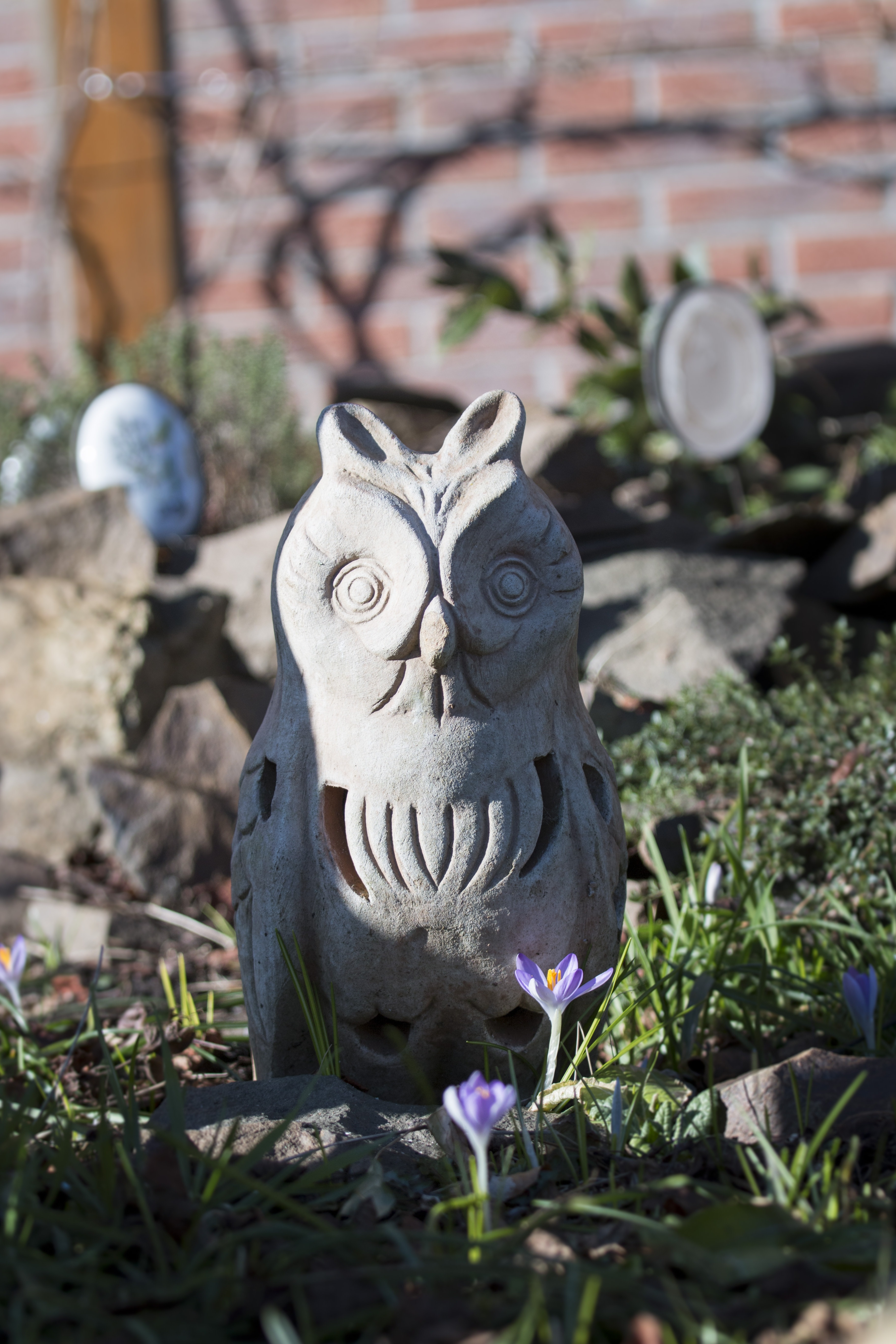white ceramic owl garden decor