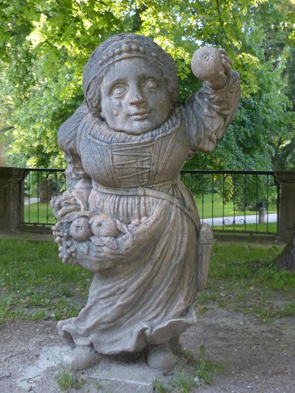 girl holding fruits concrete statue preview