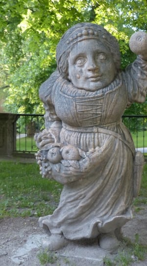 girl holding fruits concrete statue thumbnail