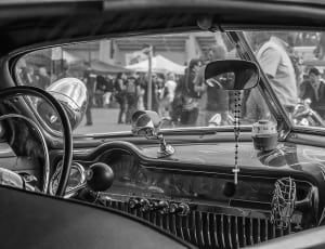 grayscale photo of interior car thumbnail
