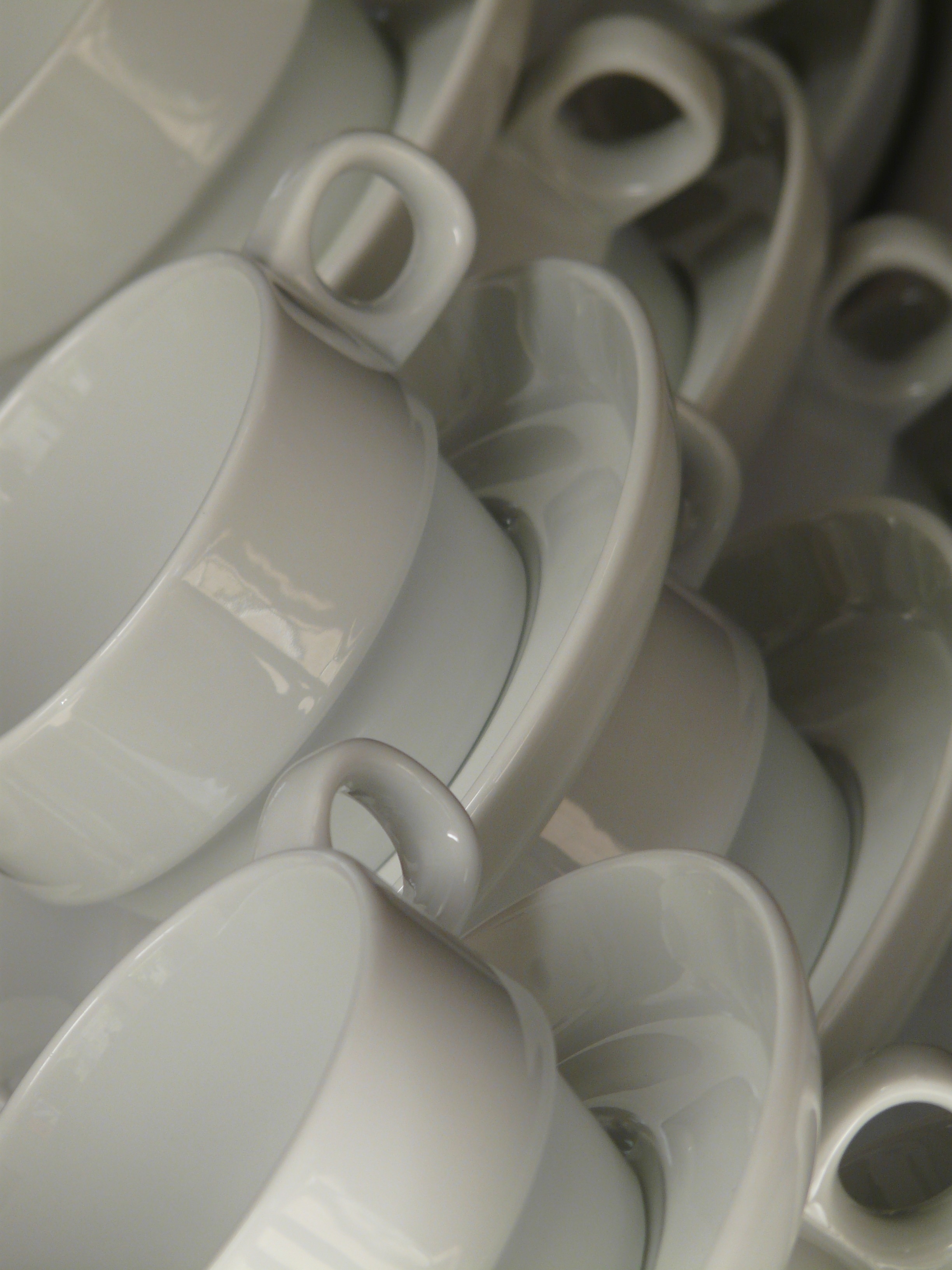 white ceramic teacup and saucer set