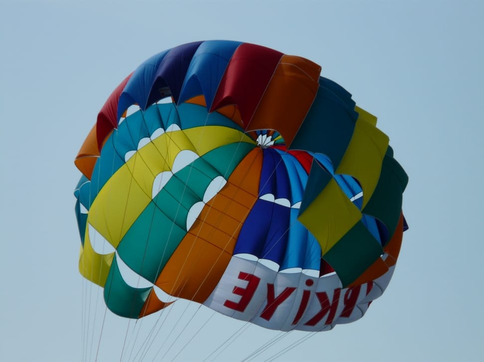 red yellow green and blue parasailing preview