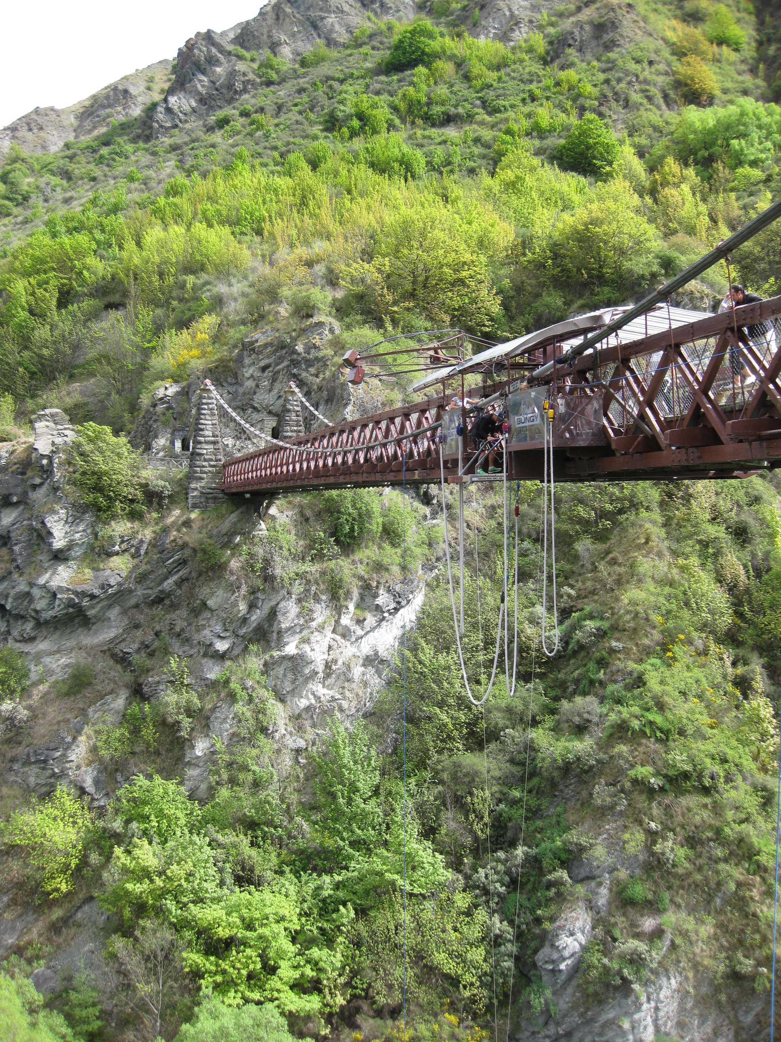 brown metal suspension bridge