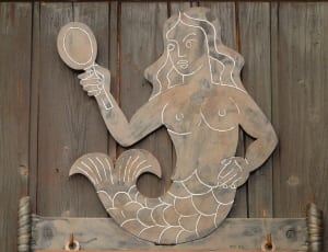 mermaid brown wooden signage thumbnail