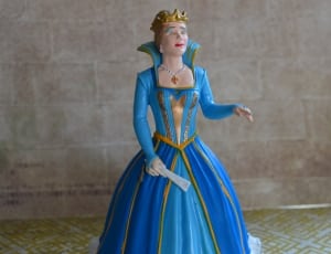 queen in blue dress figurine thumbnail