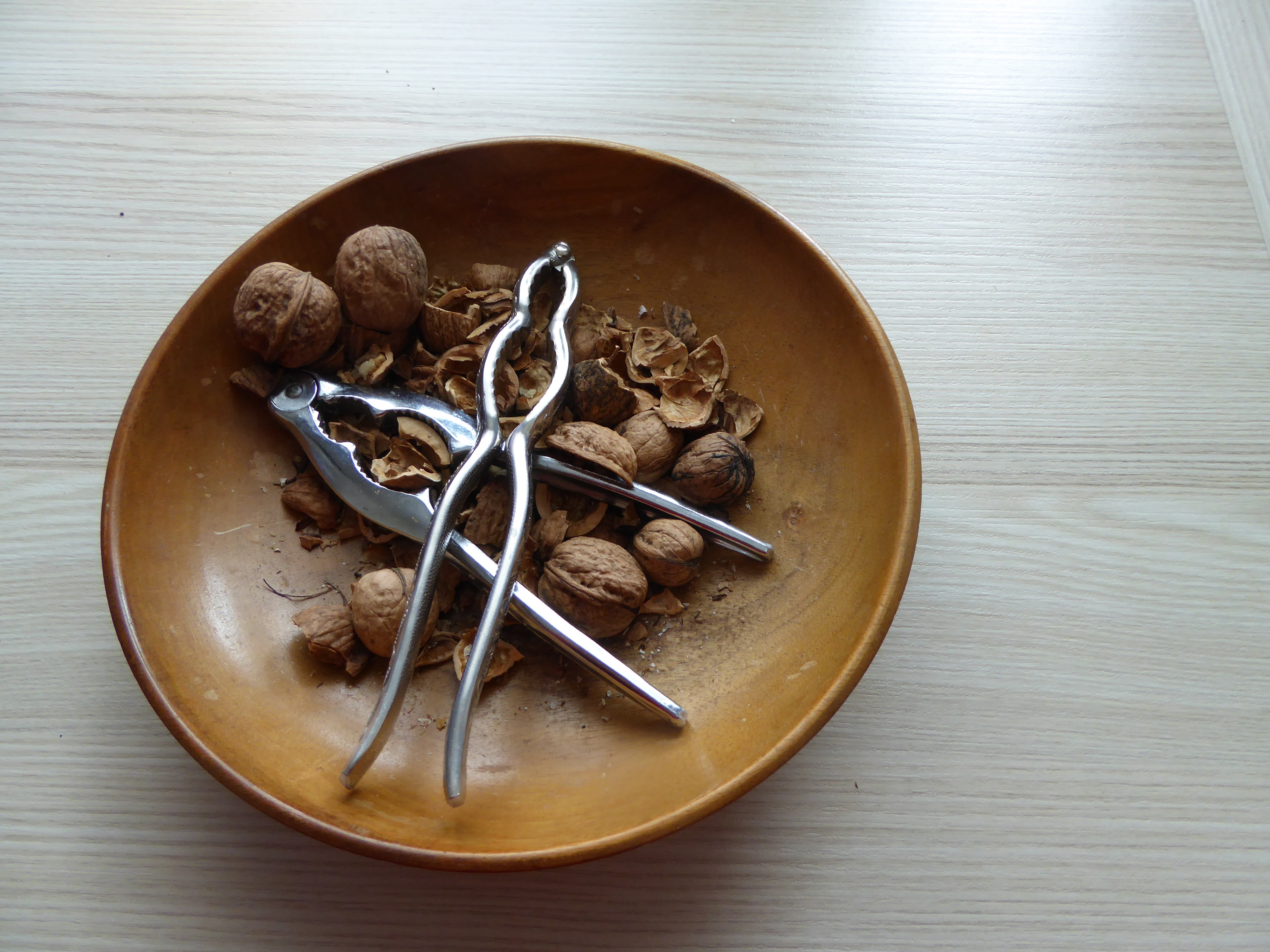 brown walnuts and silver nutcrackers