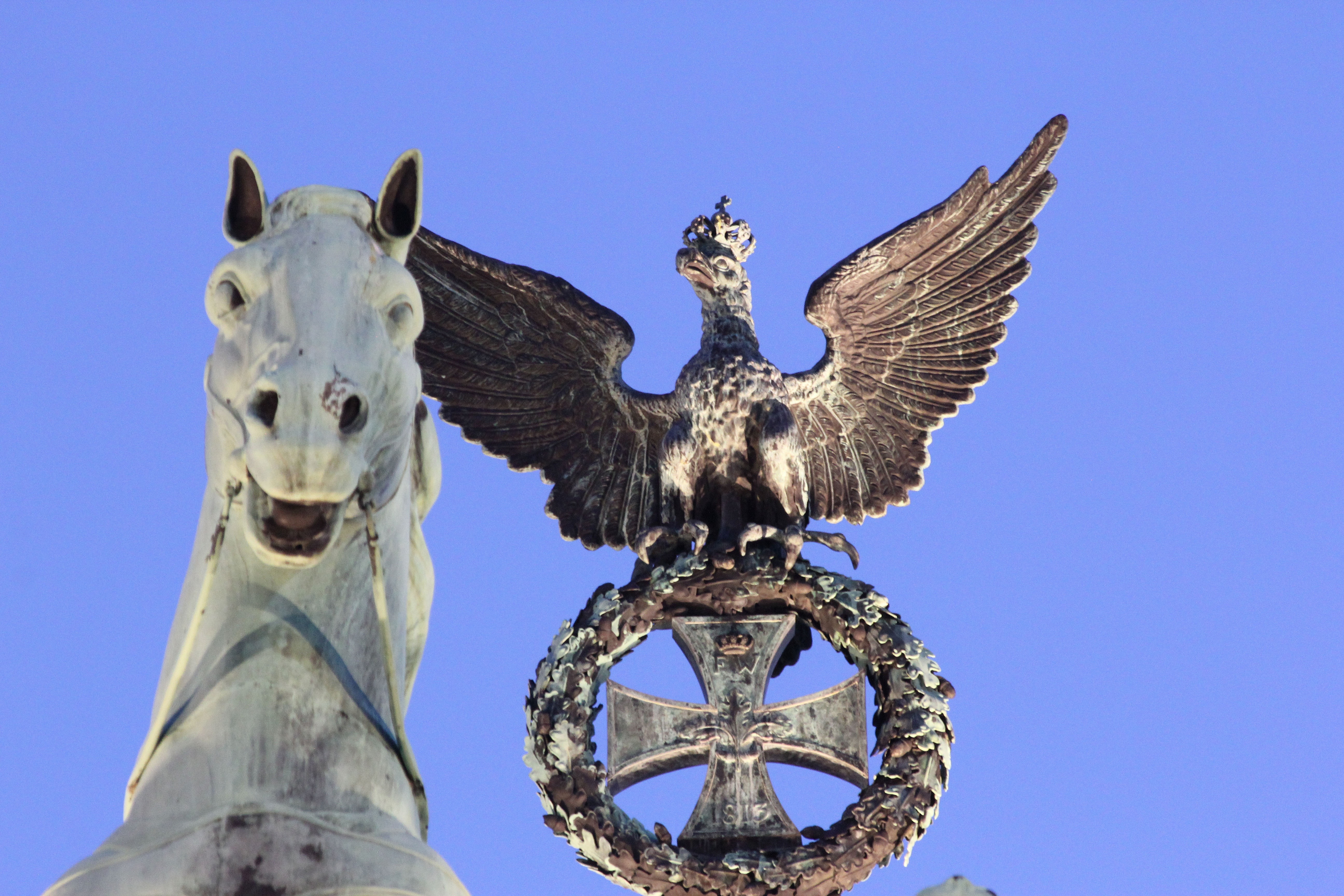 horse and eagle with crown statue