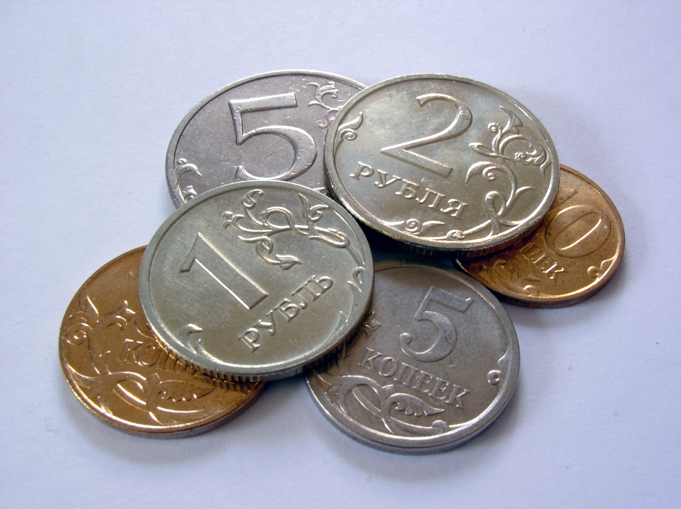 silver-and-gold round coins