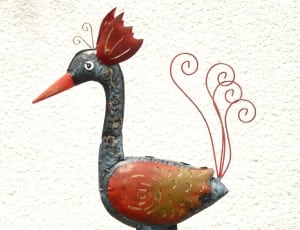 grey and brown bird figurine thumbnail