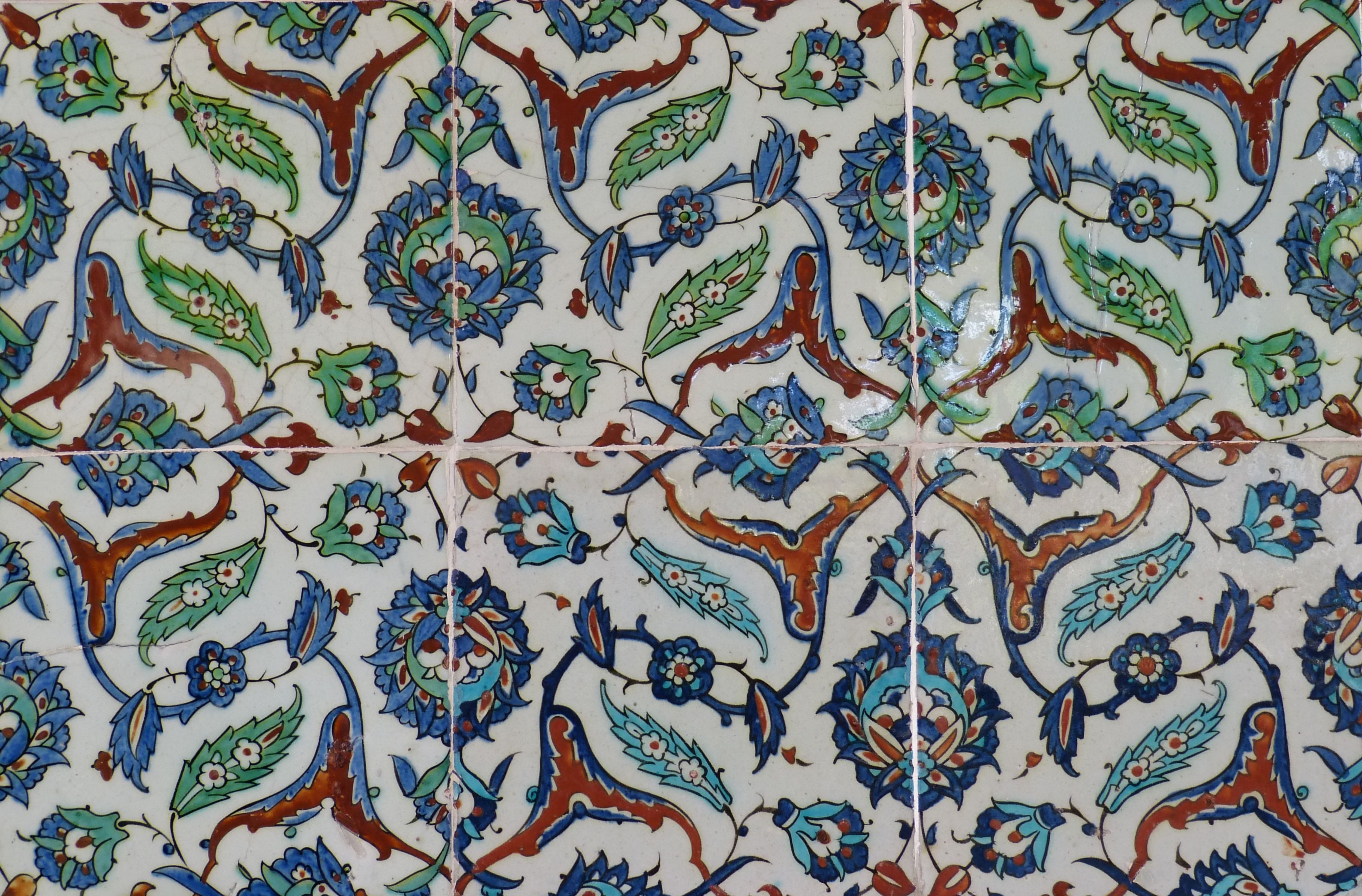 white blue orange and green floral tiles